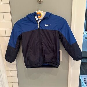 Boys fleece lined Nike Jacket Size 7 Youth. Like New, Smoke free home.